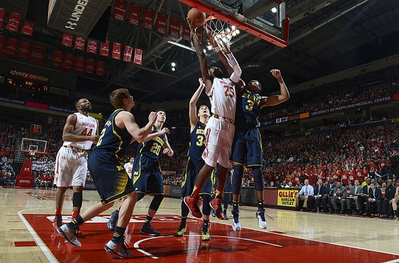 Spike Albrecht (2), Sean Lonergan (20), Mark Donnal (34), and Kameron Chatman (3)