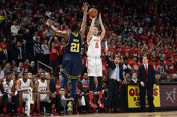 Zak Irvin (21) and Maryland Head Coach Mark Turgeon