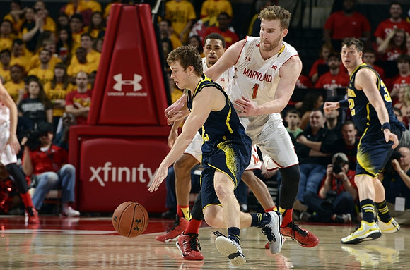 Spike Albrecht (2) and Ricky Doyle (32)