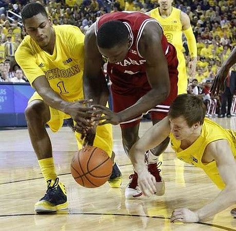 Glenn Robinson III (1), Spike Albrecht (2), and Jordan Morgan (52)