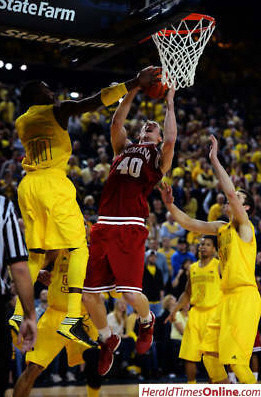 Tim Hardaway Jr. (10), Jordan Morgan (52), Trey Burke (3), and Nik Stauskas (11)