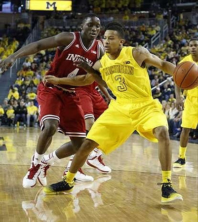 Trey Burke (3) and Glenn Robinson III (1)