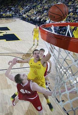 Mitch McGary (4) and Spike Albrecht (2)