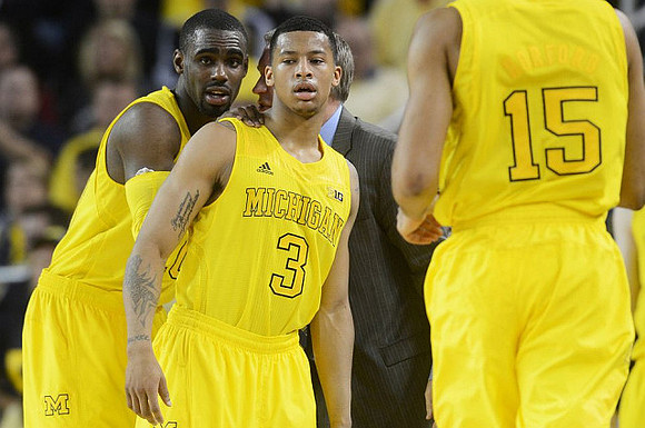 Tim Hardaway Jr. (10), Trey Burke (3), and Jon Horford (15)