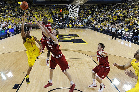 Trey Burke (3) and Jordan Morgan (52)