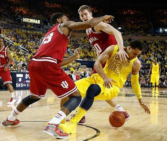 Jordan Morgan (52) and Tim Hardaway Jr. (10)