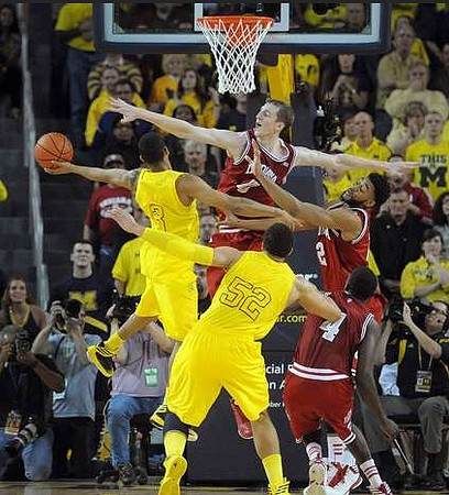 Trey Burke (3) and Jordan Morgan (52)