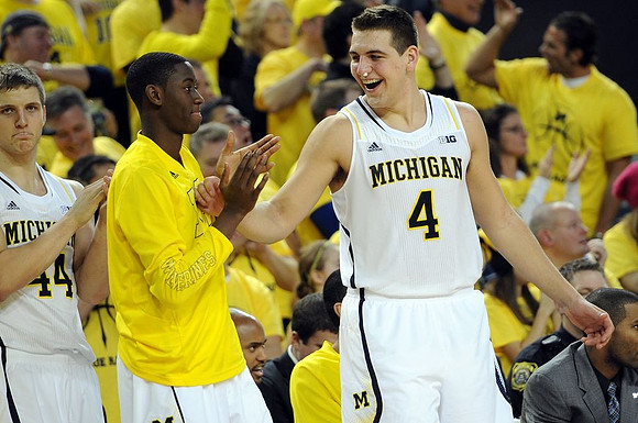 Max Bielfeldt (44), Caris LeVert (23), Mitch McGary (4), and C.J. Lee