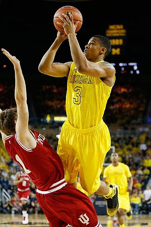 Trey Burke (3) and Glenn Robinson III (1)