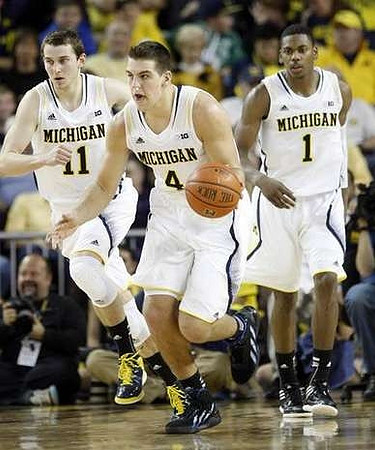 Nik Stauskas (11), Mitch McGary (4), and Glenn Robinson III (1)