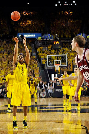 Trey Burke (3), Glenn Robinson III (1), Tim Hardaway Jr. (10), Jordan Morgan (52), and Nik Stauskas (11)