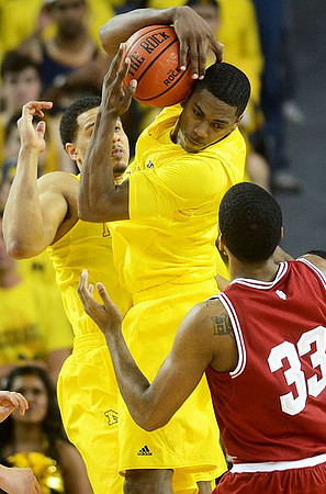 Jordan Morgan (52) and Glenn Robinson III (1)