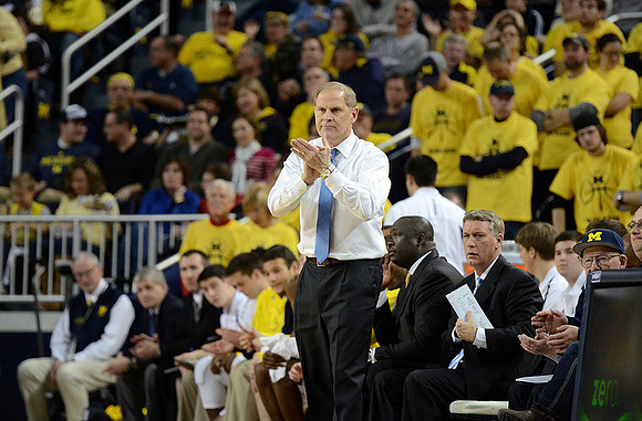John Beilein, Bacari Alexander, and Jeff Meyer