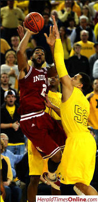 Jordan Morgan (52) and Glenn Robinson III (1)