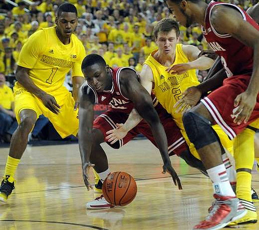 Glenn Robinson III (1) and Spike Albrecht (2)