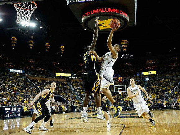 Mitch McGary (4), Glenn Robinson III (1), and Max Bielfeldt (44)