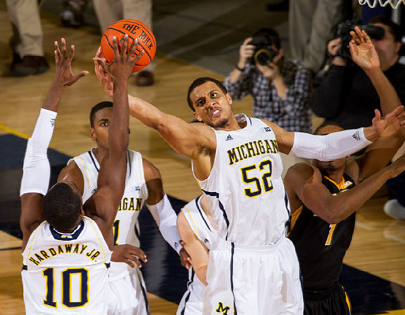 Tim Hardaway Jr. (10), Glenn Robinson III (1), and Jordan Morgan (52)