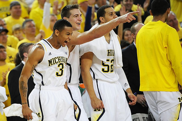Trey Burke (3), Mitch McGary (4), and Jordan Morgan (52)
