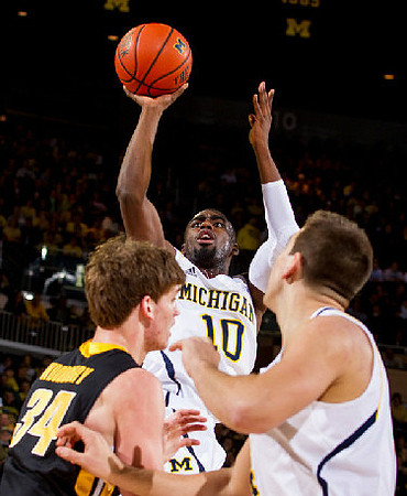 Tim Hardaway Jr. (10) and Mitch McGary (4)