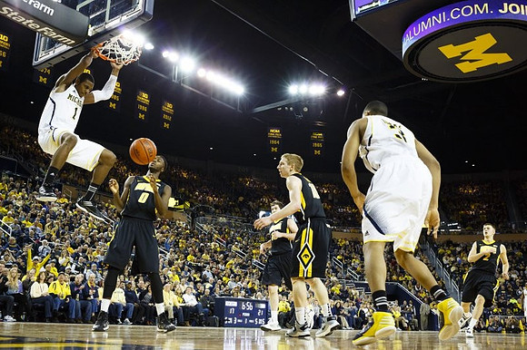 Glenn Robinson III (1) and Trey Burke (3)