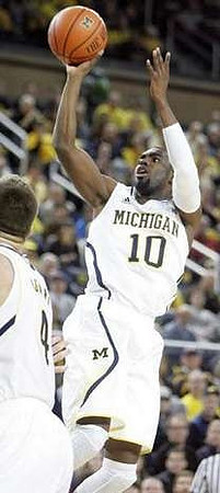 Tim Hardaway Jr. (10) and Mitch McGary (4)