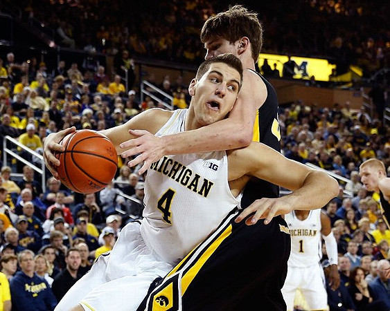 Mitch McGary (4) and Glenn Robinson III (1)