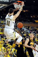 Nik Stauskas (11), Mitch McGary (4), and Tim Hardaway Jr. (10)
