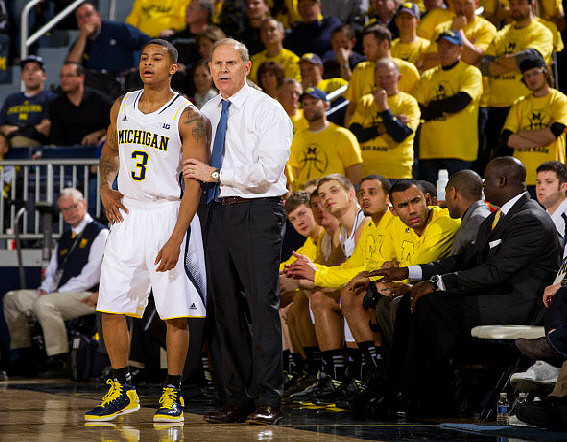 Trey Burke (3) and John Beilein