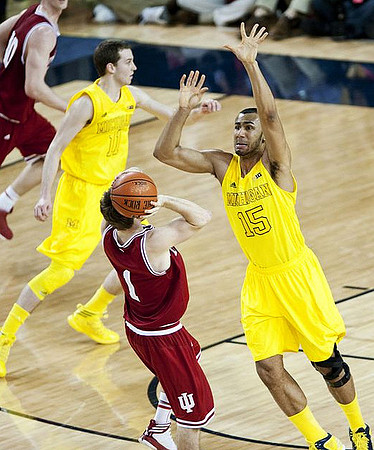 Nik Stauskas (11) and Jon Horford (15)