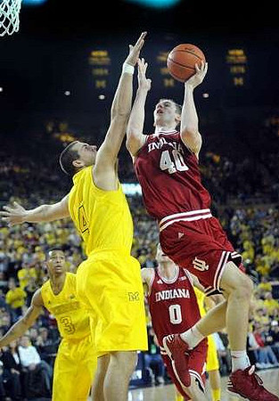 Trey Burke (3) and Mitch McGary (4)