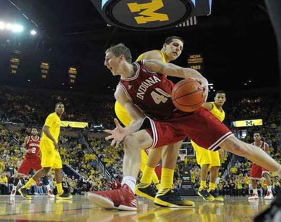 Glenn Robinson III (1), Mitch McGary (4), and Trey Burke (3)