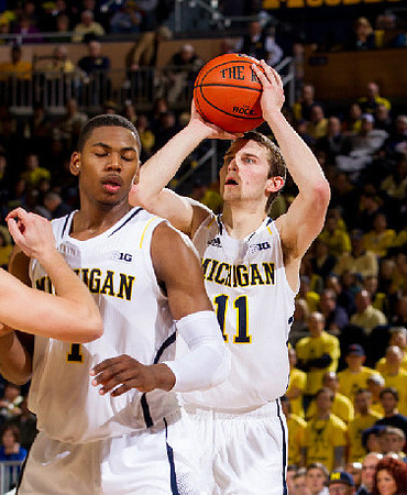 Glenn Robinson III (1) and Nik Stauskas (11)