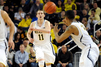 Nik Stauskas (11) and Trey Burke (3)