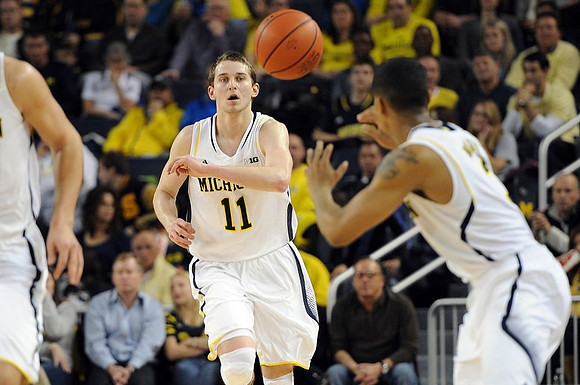 Nik Stauskas (11) and Trey Burke (3)