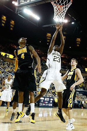 Caris LeVert (23) and Trey Burke (3)