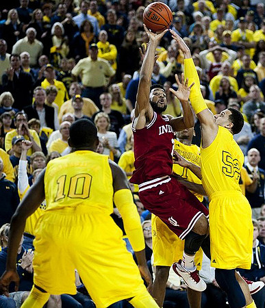 Tim Hardaway Jr. (10), Jordan Morgan (52), and Glenn Robinson III (1)