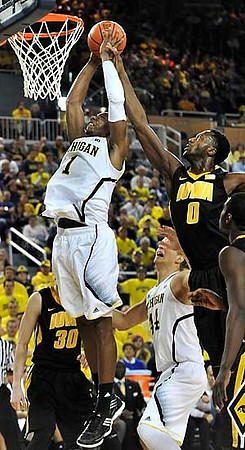 Glenn Robinson III (1) and Max Bielfeldt (44)