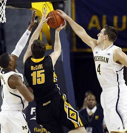 Glenn Robinson III (1) and Mitch McGary (4)