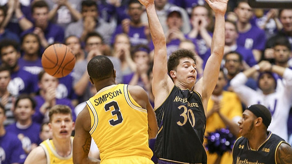 Moritz Wagner (13) and Xavier Simpson (3)