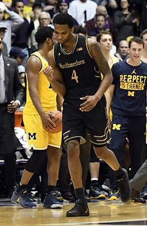 Derrick Walton Jr. (10), Mark Donnal (34), and Andrew Dakich (11)