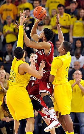 Jordan Morgan (52) and Glenn Robinson III (1)