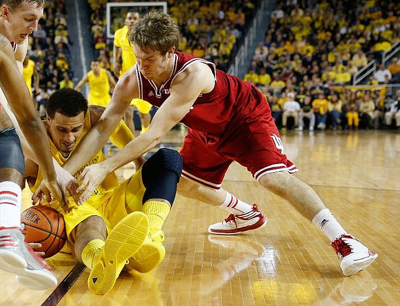 Jordan Morgan (52), Glenn Robinson III (1), and Trey Burke (3)