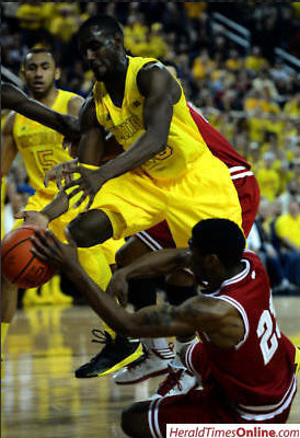 Tim Hardaway Jr. (10) and Jon Horford (15)