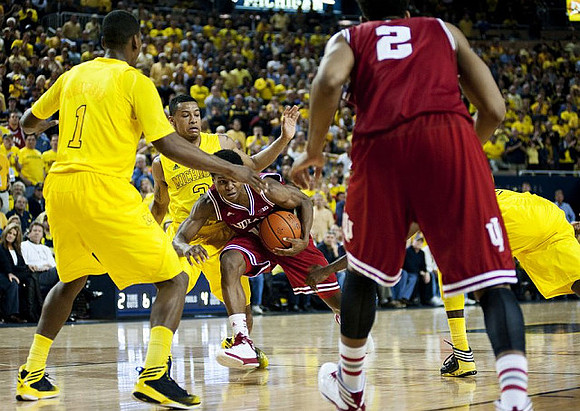 Glenn Robinson III (1) and Trey Burke (3)
