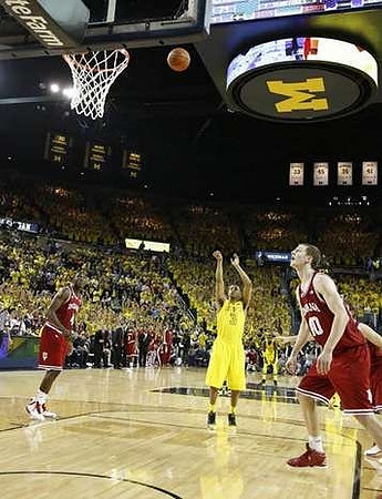 Trey Burke (3) and Tim Hardaway Jr. (10)