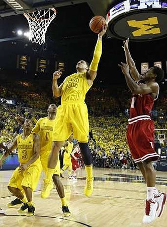 Trey Burke (3), Glenn Robinson III (1), and Jordan Morgan (52)