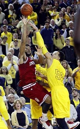 Glenn Robinson III (1) and Jordan Morgan (52)