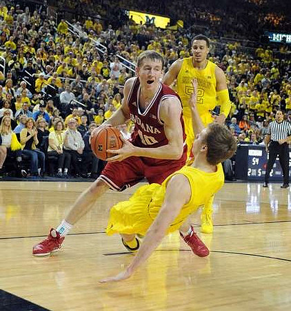 Spike Albrecht (2) and Jordan Morgan (52)