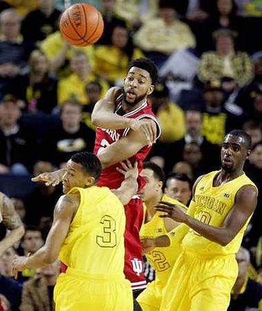 Trey Burke (3), Jordan Morgan (52) and Tim Hardaway Jr. (10)