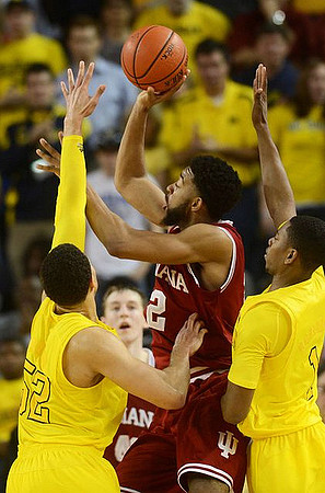 Jordan Morgan (52), Glenn Robinson III (1), and Spike Albrecht (2)